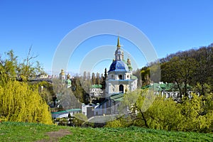 Kyiv Monastery with blue dome and golden stars in late spring day, top picturesque sceneries to visit in Kyiv