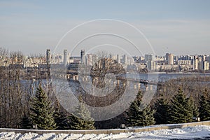 Kyiv, Ukraine. 11 30 2023: the left bank of Kyiv and the bridge over the Dnipro River