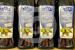 Kyiv, Ukraine 28.07.2023: - Cirio Cucina classico olive oil in glass bottles in shelf in supermarket for sale