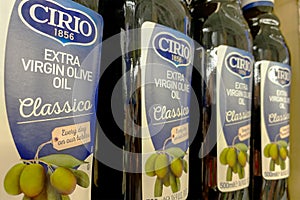 Kyiv, Ukraine 28.07.2023: - Cirio Cucina classico olive oil in glass bottles in shelf in supermarket for sale