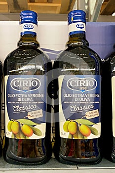 Kyiv, Ukraine 28.07.2023: - Cirio Cucina classico olive oil in glass bottles in shelf in supermarket for sale