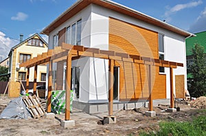 KYIV - UKRAINE, FEBRUARY - 12, 2017: Contemporary Outdoor Terrace. Modern Home Construction with wooden pillars terrace patio ins