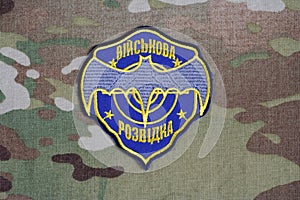 KYIV, UKRAINE - July, 16, 2015. Ukraine's military intelligence uniform badge on camouflaged uniform