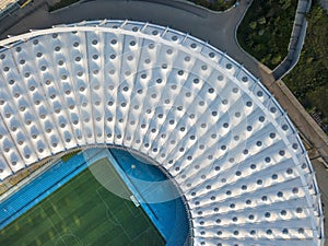 KYIV, UKRAINE - July 19, 2018. NSC Olimpiysky the birds eye view from drone of construction the stadium roof, green