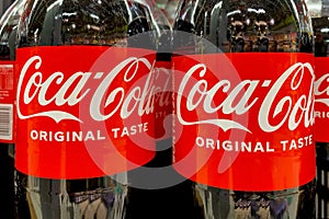 Kyiv, Ukraine, June 2023: - Coca Cola Original fizzy carbonated beverage in plastic bottle label close up