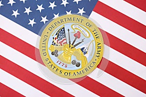 KYIV, UKRAINE - MARCH 9, 2024 US Department of Army seal on United States of America flag