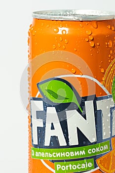 Close up shot of classic Fanta orange can on the white background. Popular product of The Coca-Cola