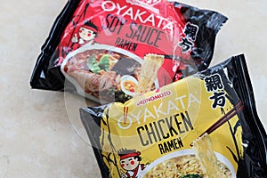 KYIV, UKRAINE - OCTOBER 31, 2023 Packs of of Ajinomoto Oyakata Japanese instant noodles chicken ramen and soy sauce
