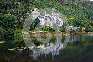 Kylemore Abbey in Ireland with reflections in the Pollacapall Lough