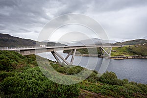 Kylesku Bridge in Northern Scotland, on the NC 500 Tourist Driving Route. photo