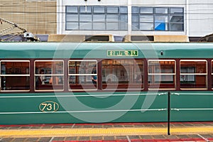 Eizan Electric Railway train stops at the Demachiyanagi Station. Kyoto, Japan.