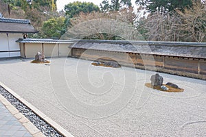 The Kare-sansui dry landscape zen garden at Ryoan-ji Temple in Kyoto, Japan. It is part of Historic