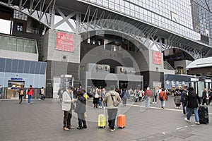 Crowd of people at the main entrance to Kyoto Station