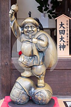Kyoto, Japan novemer 24, 2016: The Ebisu brass statue in Kiyomizu-dera Temple, kyoto, Japan. Ebisu is iconic Japanese God of Good