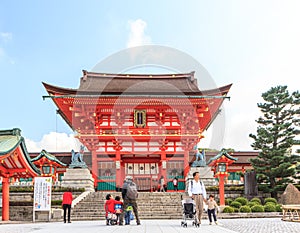 KYOTO, JAPAN - OCT 30 : Tourists at Fushimi Inari Shrine on October 30 2013. The shrine is famous for its torii gates walkway