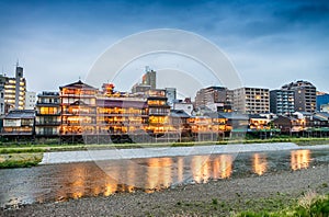 Kyoto, Japan. Sunset view of cityscape along river