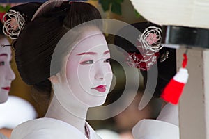 KYOTO - JULY 24: Unidentified Maiko girl (or Geiko lady) on parade of hanagasa in Gion Matsuri (Festival) held on July 24 2014 in