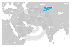 Kyrgyzstan blue marked in political map of South Asia and Middle East. Simple flat vector map
