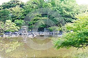 Kyu-Furukawa Gardens in Tokyo, Japan. The park includes an old western-style mansion with a rose