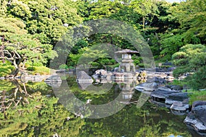 Kyu-Furukawa Gardens in Tokyo, Japan. The park includes an old western-style mansion with a rose