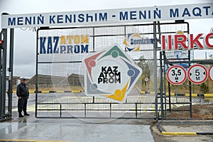 Kyzylorda region, Kazakhstan - 09.14.2019 : Inscription: KazAtomProm at the entrance of the territory of the uranium mining