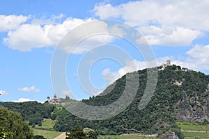 KÃ¶nigswinter, Germany - 06 28 2022: Two castles on the Dragon\'s rock, Drachenfels