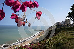 l view of La Rosa Nautica by the sea in Makaha Beach.Route costa verde, Group of surfers learning to surf in a bright summer