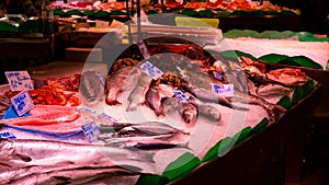 La Boqueria is a famous market located in El Raval with an entrance to the market from La Rambla. It provides a wide variety of