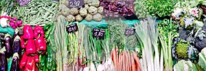 La Boqueria market with seasonal fresh farm vegetables in Barcelona