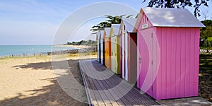 La Bree-les-Bains village wooden brightly coloured beach huts on West atlantic beach french oleron island