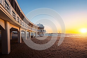 La Caleta Beach, Balneario de la Palma Building and Castle of San Sebastian at sunset - Cadiz, Andalusia, Spain photo