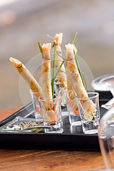 A la carte designed crispy deep-fried spring roll in mini glas