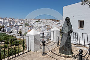 La cobijada, monument to the woman of Vejer de la Frontera in Cadiz, Andalusia, Spain photo