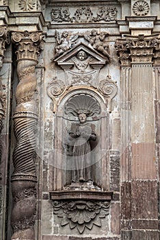 La Compania Church entrance with statue of male, Quito, Ecuador