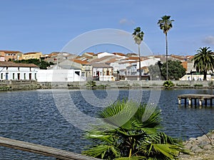 La Coronada fishing pond with village view photo