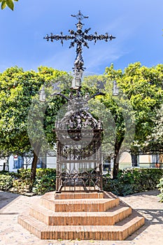 La Cruz de las Sierpes, the Cross of the Serpents, from 1692 sited in the Plaza de Santa Cruz,