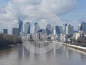 La Defense business district and The Seine seen from Levallois`s bridge, France