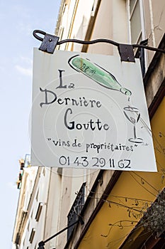 La Derniere Goutte wine shop sign in Paris, France