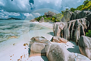 La Digue island, Seychelles. Beautiful holiday vacation view at paradise Anse Source d`Argent beach with shallow blue