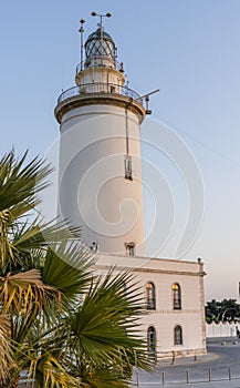 La Farola de MÃÂ¡laga Lighthouse on Sunny Summer Evening photo