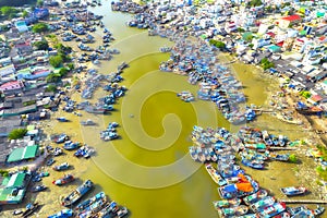 La Gi fishing village seen from above with hundreds of boats anchored along both sides of river
