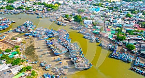 La Gi fishing village seen from above with hundreds of boats anchored along both sides of river