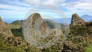 LA GOMERA, SPAIN: View of mountainous landscape from the Mirador Degollada de Peraza towards Teide Volcano in Tenerife Island photo