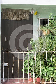 La Havana, Cuba, January 9, 2017: orisha yoruba religious symbol at door from a house. General travel imagery