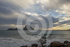 La isla de Es vedra desde Ibiza al atardecer photo