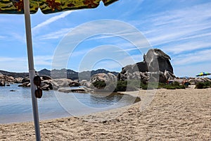 La Maddalena, Sardinia, Italy - Sea, sun sand and rocks on the beach of Testa di Polpo photo