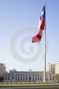 La Moneda, Chile's government palace with flag photo