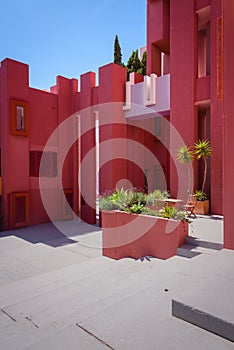 La Muralla Roja building, Red Wall building by the sea in Calp, Spain photo