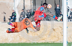 Viktoria Plzen striker Rafiu Durosinmi and Ferencvaros goalkeeper Denes Dibusz during club friendly Ferencvaros vs Viktoria Plzen