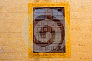 La Orotava wooden window in yellow wall Tenerife photo